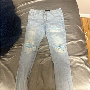 AMIRI Light Blue Distressed Skinny Jeans